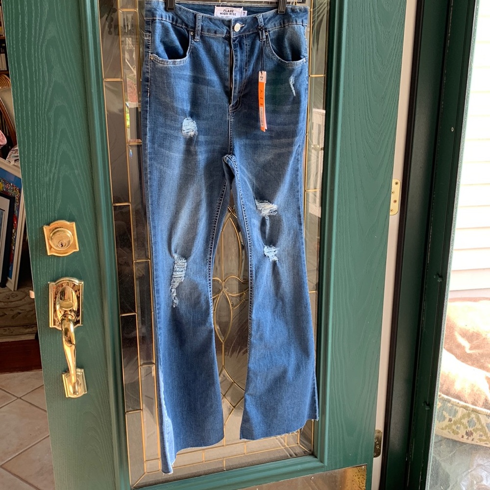 Refuge Ripped Blue Jeans. size 7